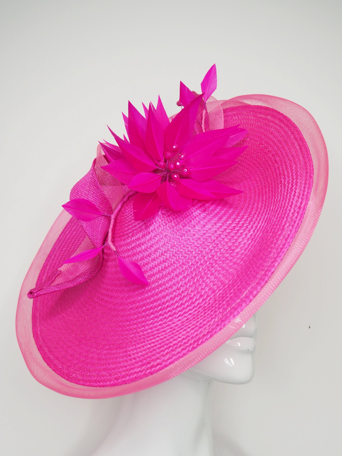 Big and Bright - Shocking pink buntal straw curved Saucer brim with Feather flower and crinoline edge