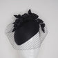 Black beauty - Facehugger base with parisisal straw and veil & leather rose detail