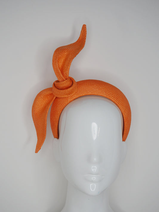 Tied in a Knot- Orange 3D blocked headband with a simple straw knot