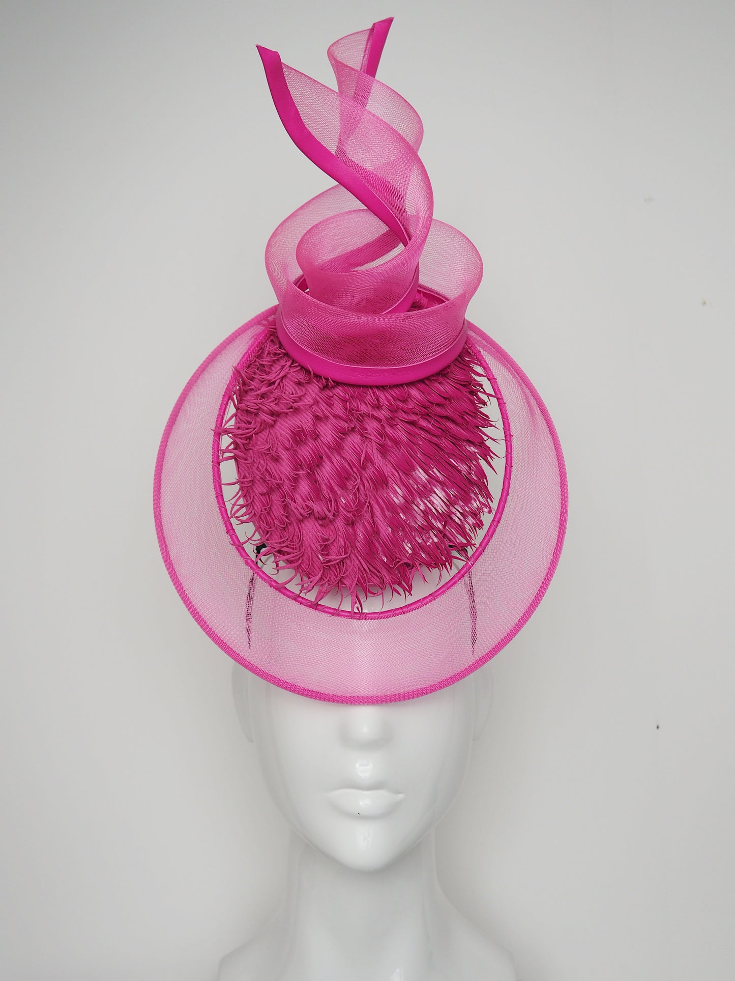 Tilt-a-whirl - Pink shredded patent leather percher with wired crinoline veil and swirl