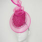 Tilt-a-whirl - Pink shredded patent leather percher with wired crinoline veil and swirl