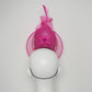 Tilt-a-whirl - Pink shredded patent leather percher with wired crinoline veil and swirl