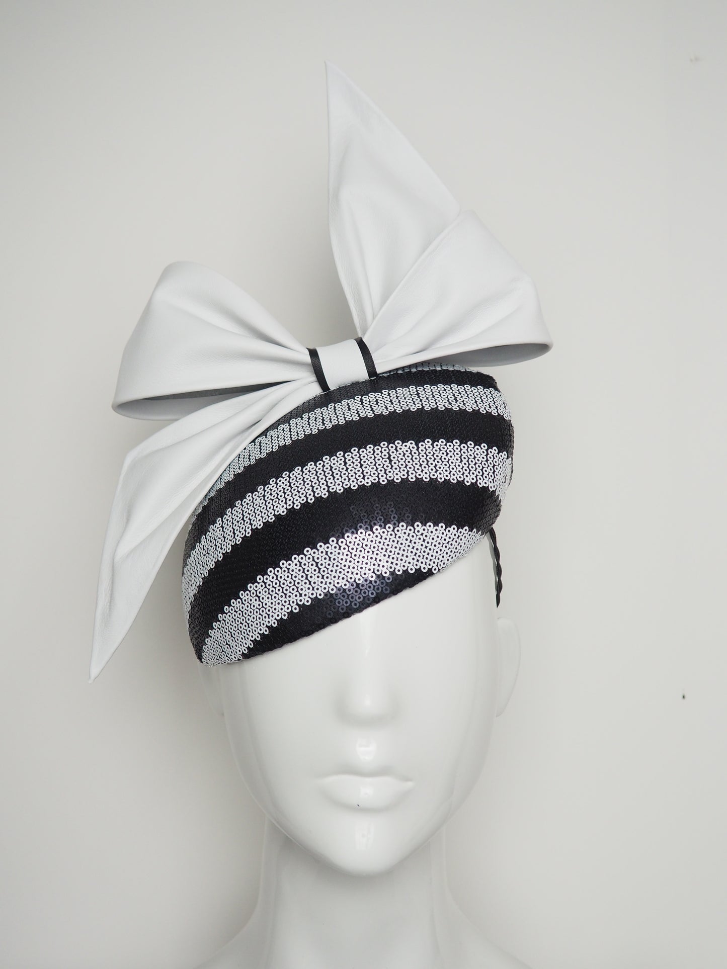 Bowie -White Leather bow with black and white sequin striped beret base