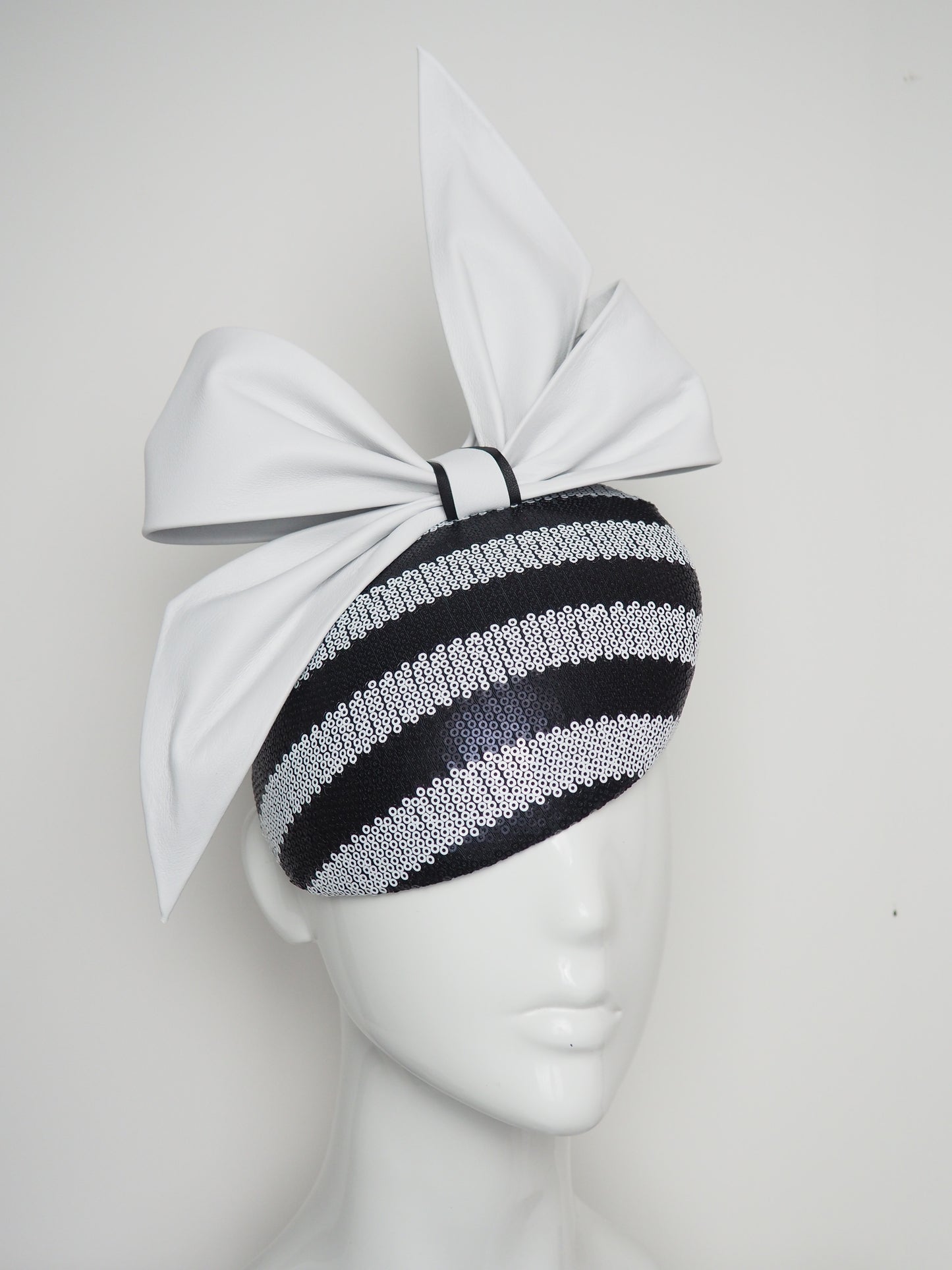 Bowie -White Leather bow with black and white sequin striped beret base