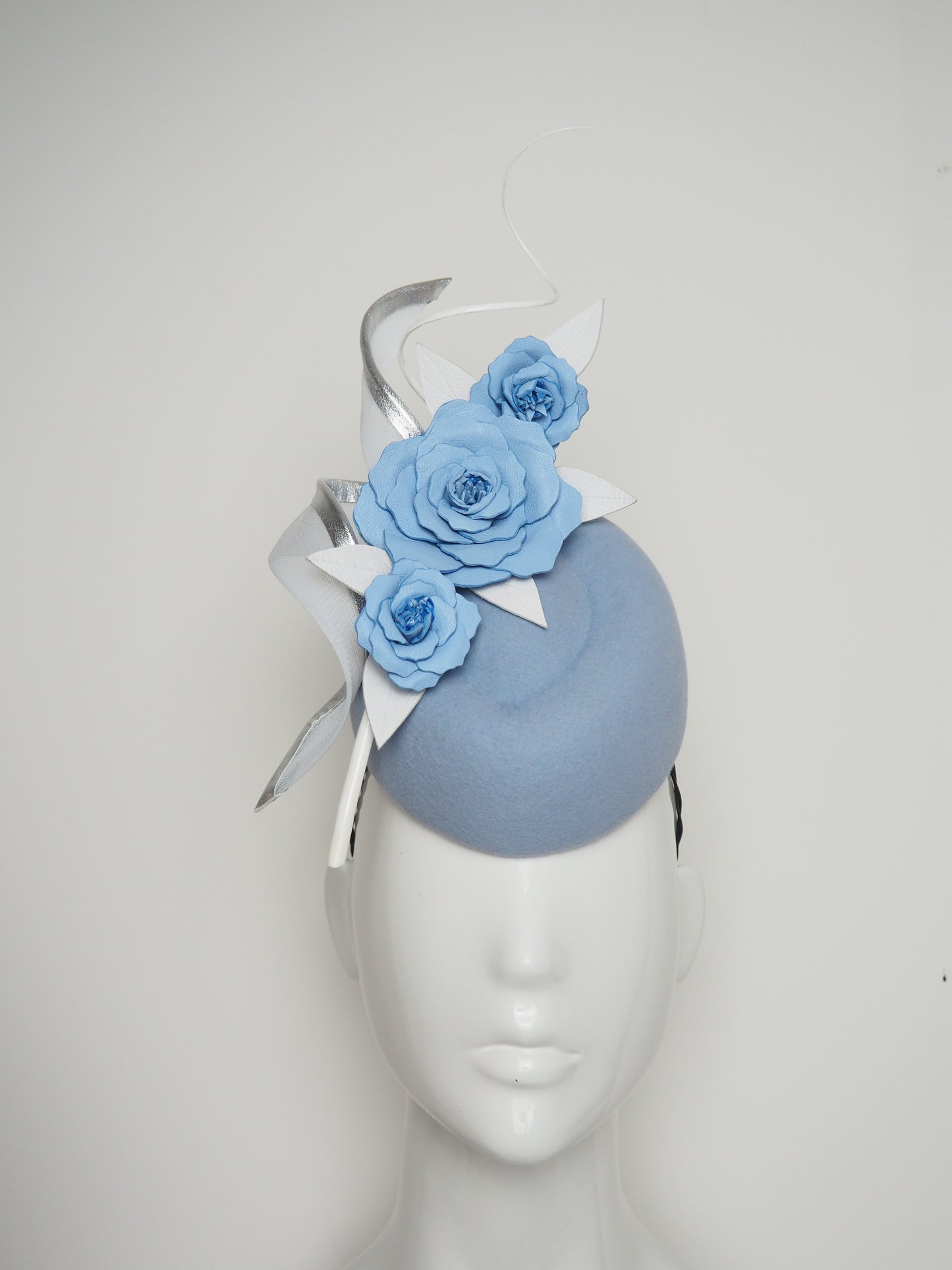 Blowing in the wind  - Baby blue fur felt headpiece with a cascade of roses, quills and silver edged swirl