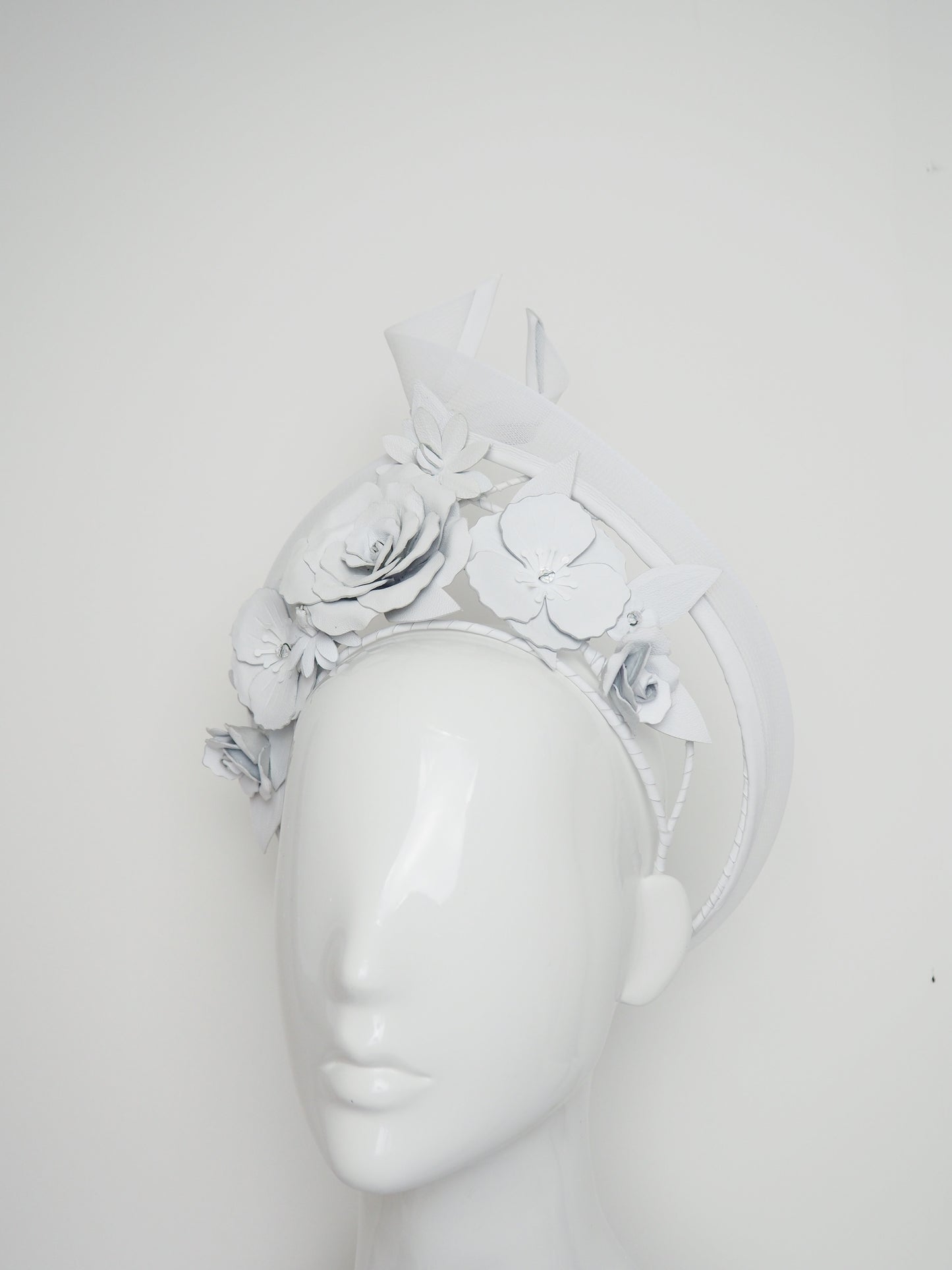 Forever And Always - White asymmetrical wired leather pointed halo with roses, poppies and blossoms