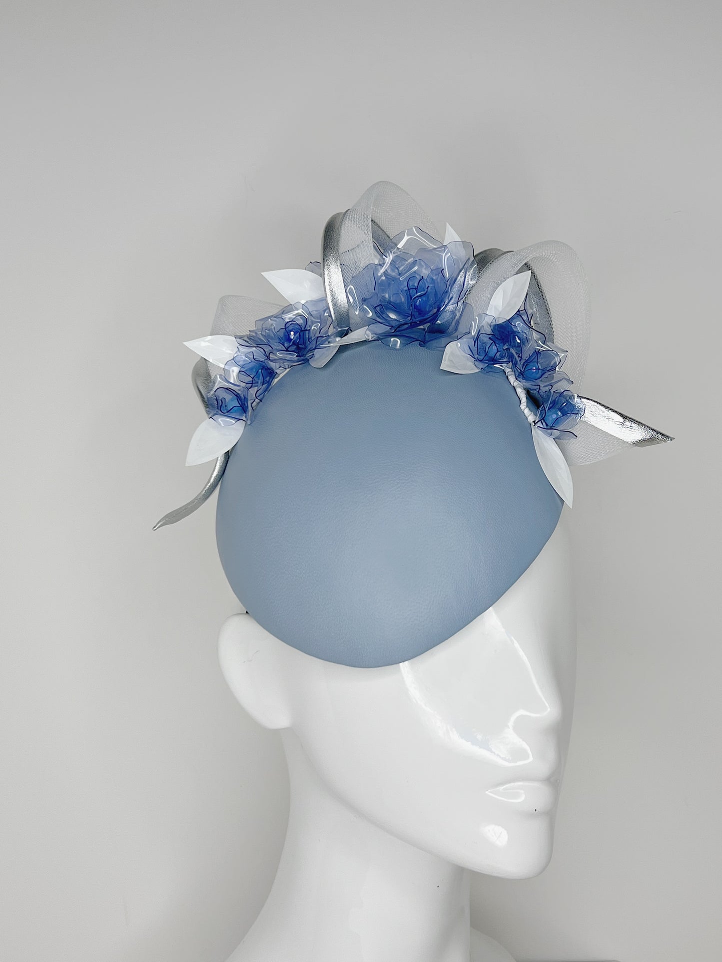 Blue Belle - Powder blue leather face hugger Beret with crystoform roses and silver edged swirl