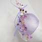 Purple Sky - Lilac facehugger base with sequinned blossoms and quills.