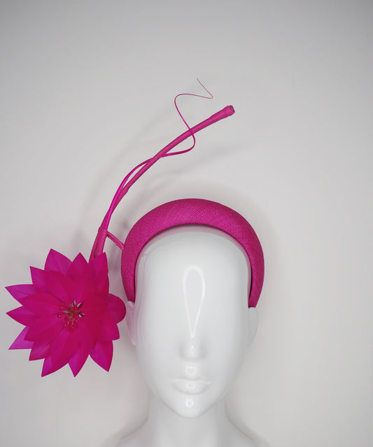 Flower burst - Hot Pink Tinalak straw base with sculpted quills and fleather starburst.