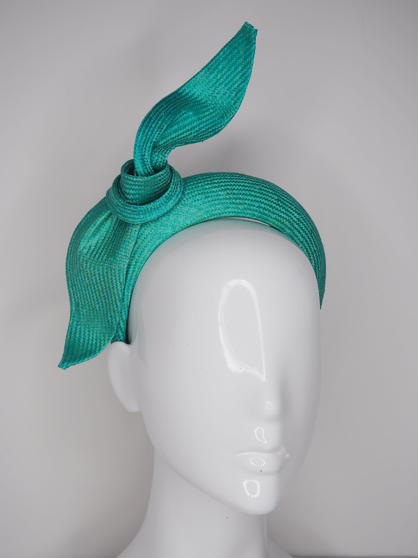 Tied in a Knot- Jade green 3d blocked headband with a simple straw knot
