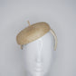 Knotty But Nice -  button beret on a Natural Straw headband.