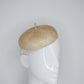 Knotty But Nice -  button beret on a Natural Straw headband.