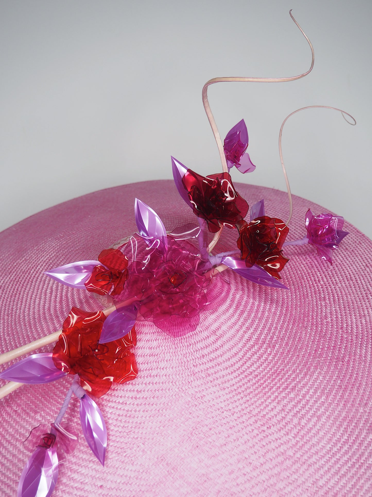 Pink Robin - Candy Pink Coolie brim with Crystoform roses in shades of pink and red with a touch of purple