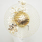 All That Glitters - Gold woven leather percher with gold cutout flowers