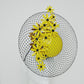 Gloriosa Daisies - Patent yellow leather percher with Gloriosa Daisies and a floating wired veil