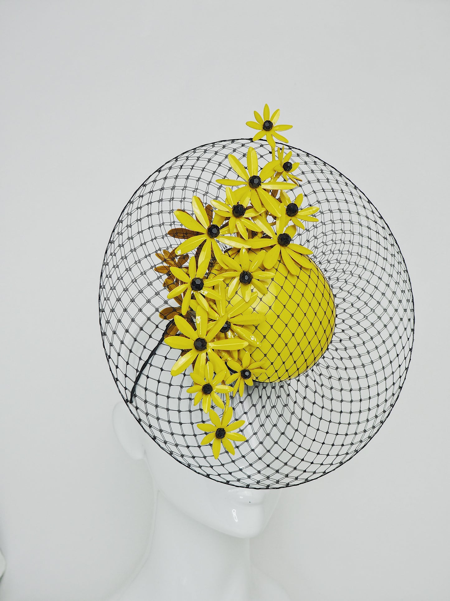 Gloriosa Daisies - Patent yellow leather percher with Gloriosa Daisies and a floating wired veil