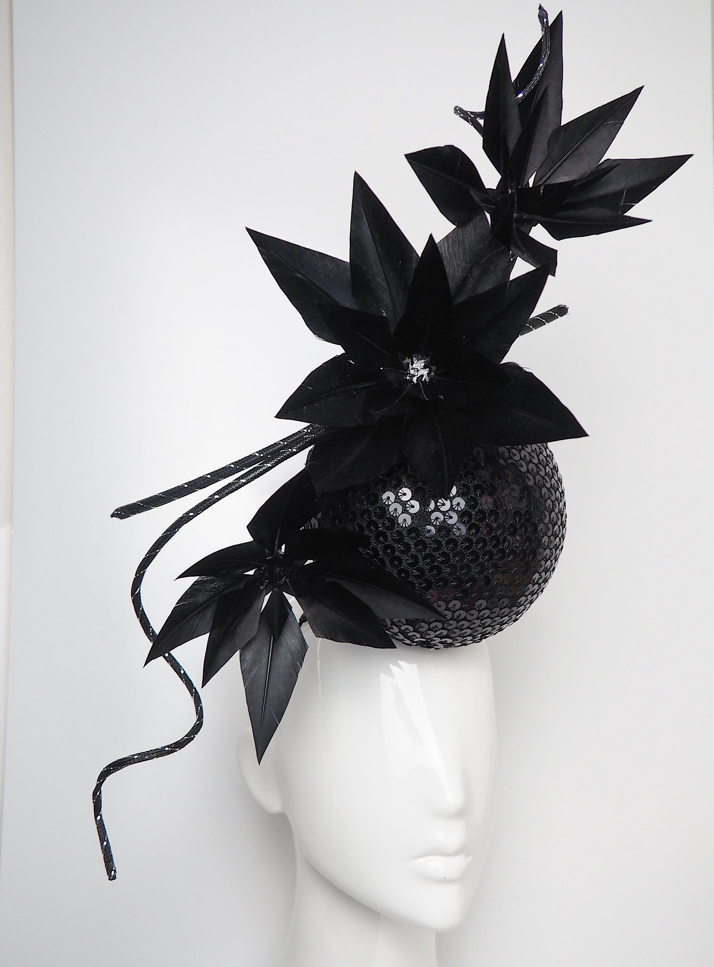 Disco Nior - Sequin percher sphere with black feather flowers and metallic swirl Quills.