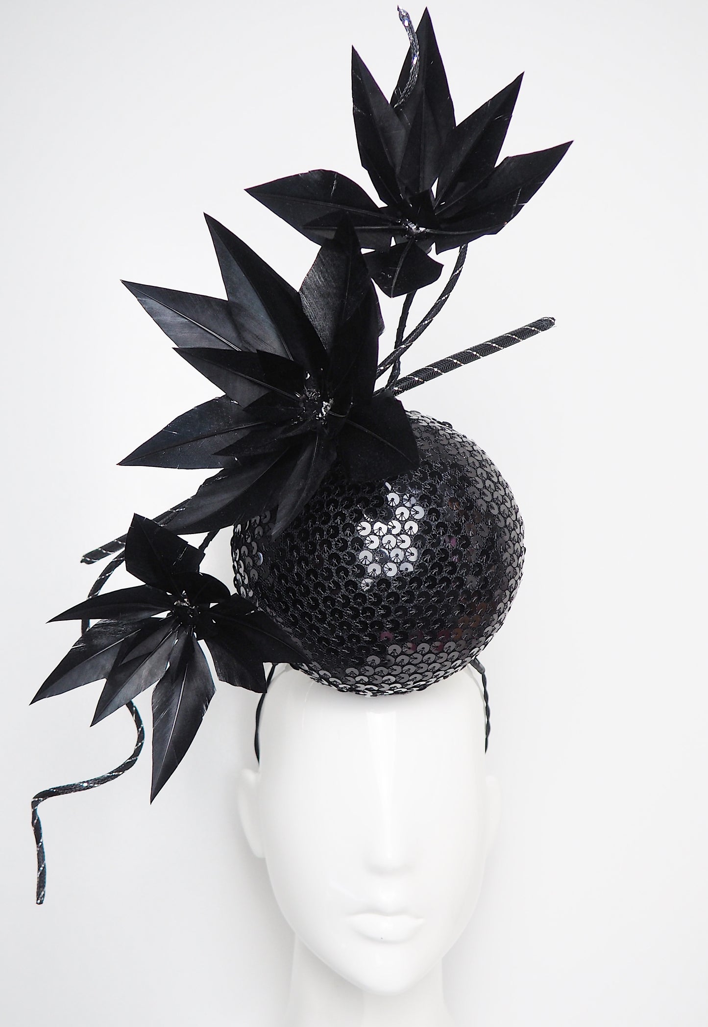 Disco Nior - Sequin percher sphere with black feather flowers and metallic swirl Quills.