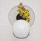 Gloriosa Daisies - Patent yellow leather percher with Gloriosa Daisies and a floating wired veil