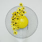 Gloriosa Daisies - Patent yellow leather percher with Gloriosa Daisies and a floating wired veil