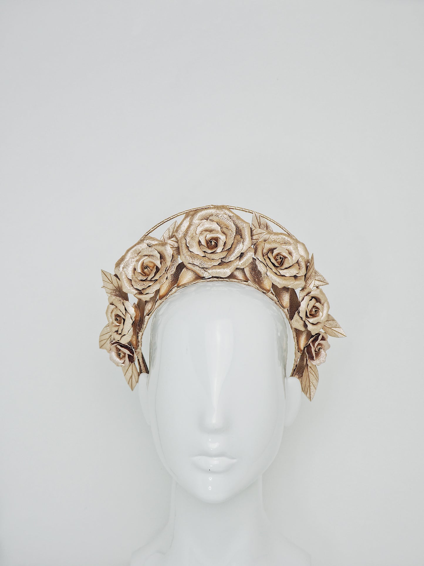 Garden of Eden  -  Rose gold leather rose halo with a single wire frame.