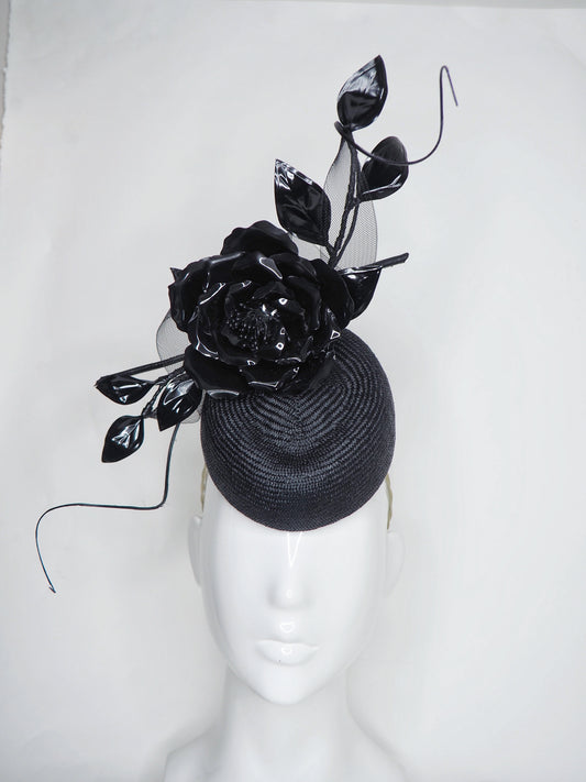 Midnight rose - pork pie pillbox with crystoform rose, metal leaves, quills and crinoline swirl.