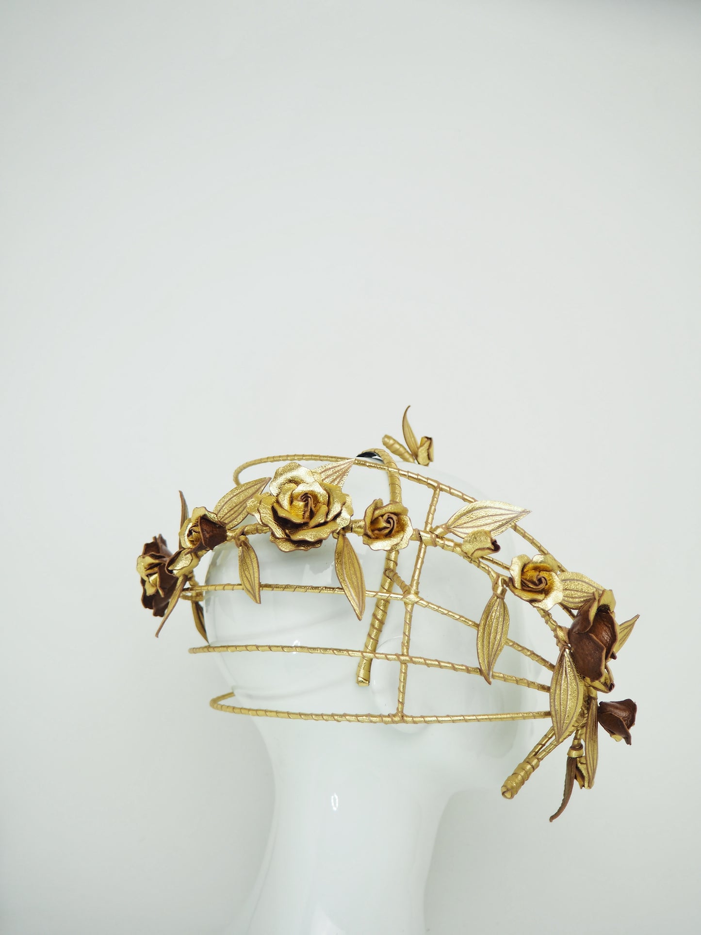 Ray of Light - Back facing wired headband with trailing golden leather rose vine detail