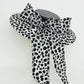 Stepping out - Medium shallow boater with black and off white bow detail