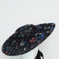 Magic Dust - Tulle wire brimmed boater with petersham ties and glitter printed flowers.