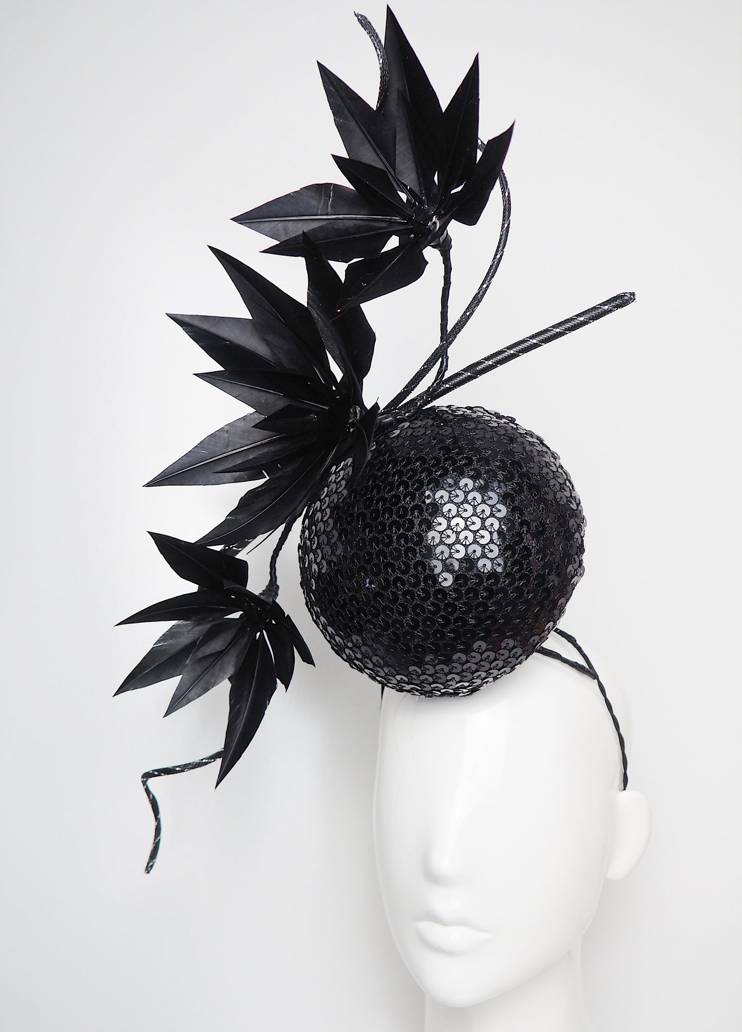 Disco Nior - Sequin percher sphere with black feather flowers and metallic swirl Quills.