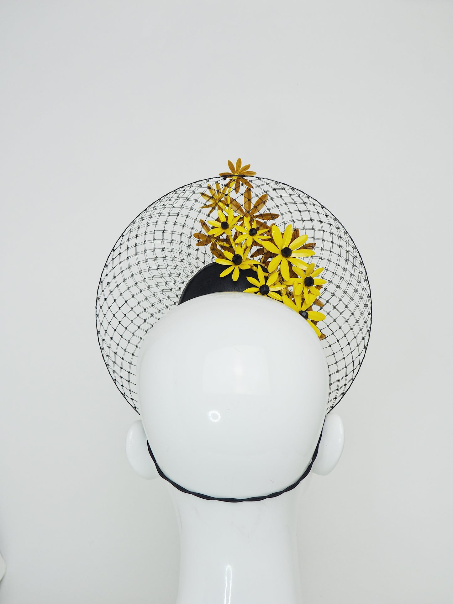 Gloriosa Daisies - Patent yellow leather percher with Gloriosa Daisies and a floating wired veil