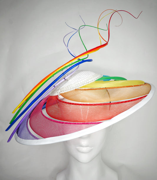 Over The Rainbow - Rainbow crinoline wired brim with textured white crown and rainbow quills.