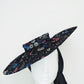 Magic Dust - Tulle wire brimmed boater with petersham ties and glitter printed flowers.